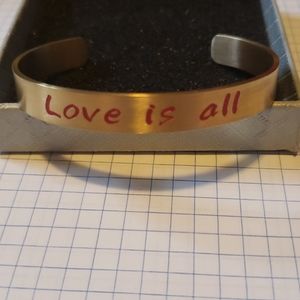 Gold tone cuff bracelet